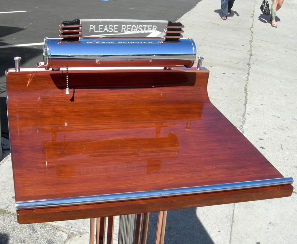 An incredibly glamorous stand in fully restored condition, this beauty will make a great first impression on everyone entering your home or place of business. All the copper and chrome elements have been re-plated, the wooden top has been