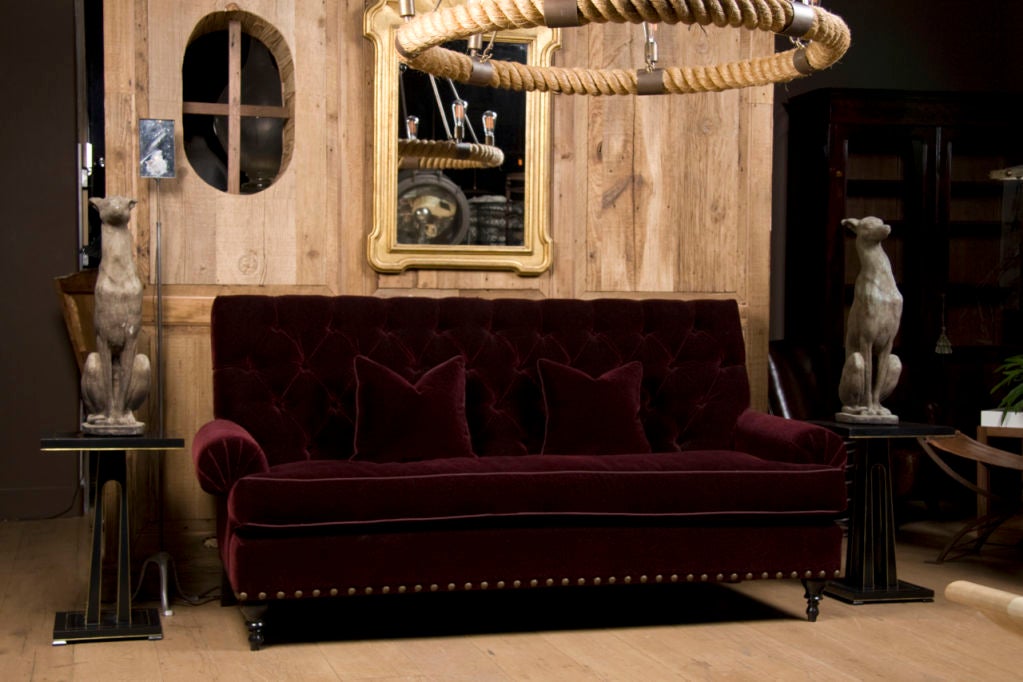 a charming high back tufted Edwardian sofa on turned ebonized wood legs, single seat cushion with rolled pad arms, upholstered in a Bordeaux Holly Hunt Mohair <br />
Large Scale Antiqued Nailhead Trim