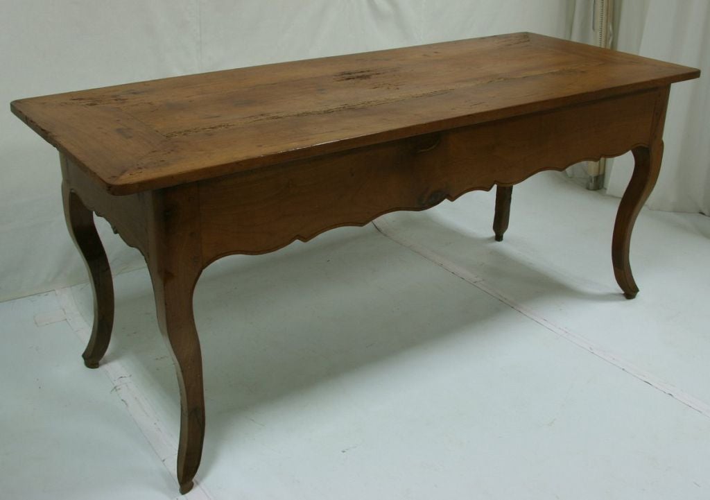 18th century cherry cabriole leg farm table.
Fruitwood. Measures: 30.5'' H x 71.5'' W x 28.5D (22 clearance).
Sofa table, hall table.