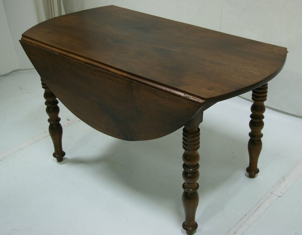 19th century Louis Philippe walnut French table (also center table, coffee table, side table, dining table).