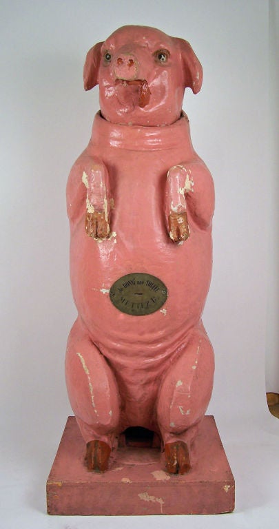 Beyond wonderful! This bigger than life-size papier mache pig with original pink paint. The brass plaque reads: Je Donne une Truffe Mettez 1 fr. 