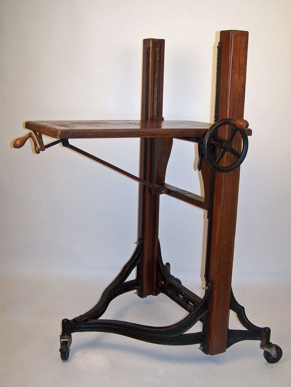 Old adjustable camera stand. Has original plaque that reads Century Camera Co. made by Eastman Kodak Co.