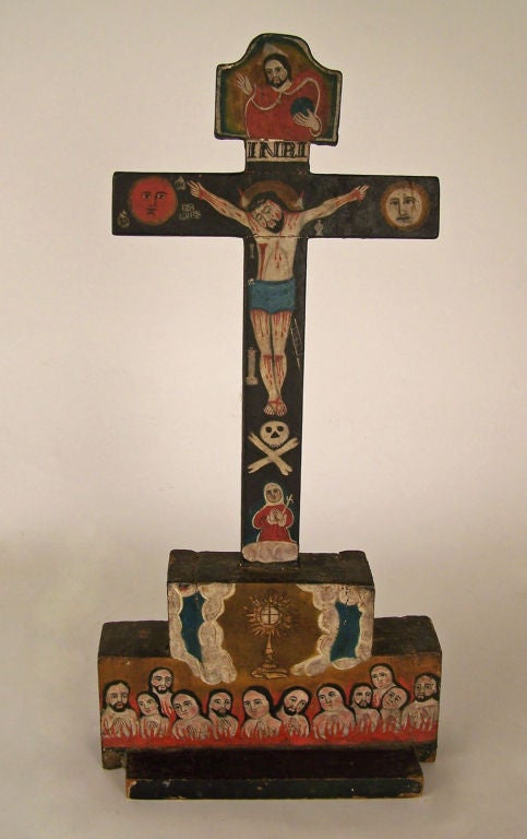 An interesting hand painted folk art crucifix. Probably Mexican.