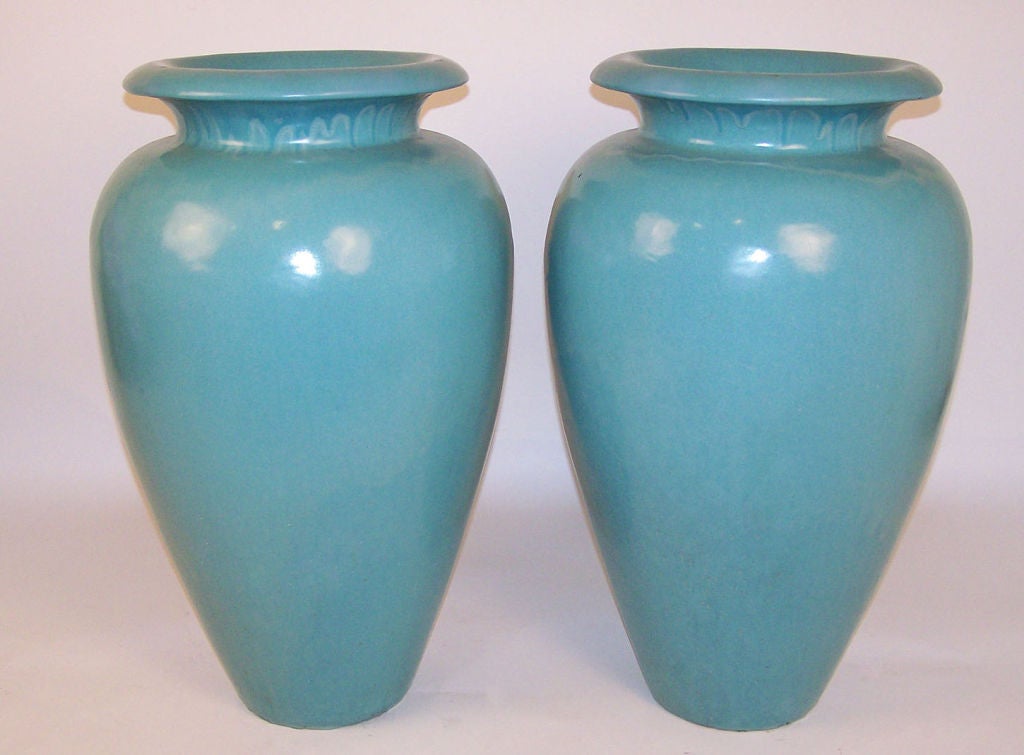 A pair of unusually large size oil jars made by the Gladding McBean Company (California architectural faience).