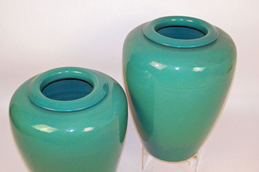 Beautiful green glazed ceramic oil jars by Garden City.