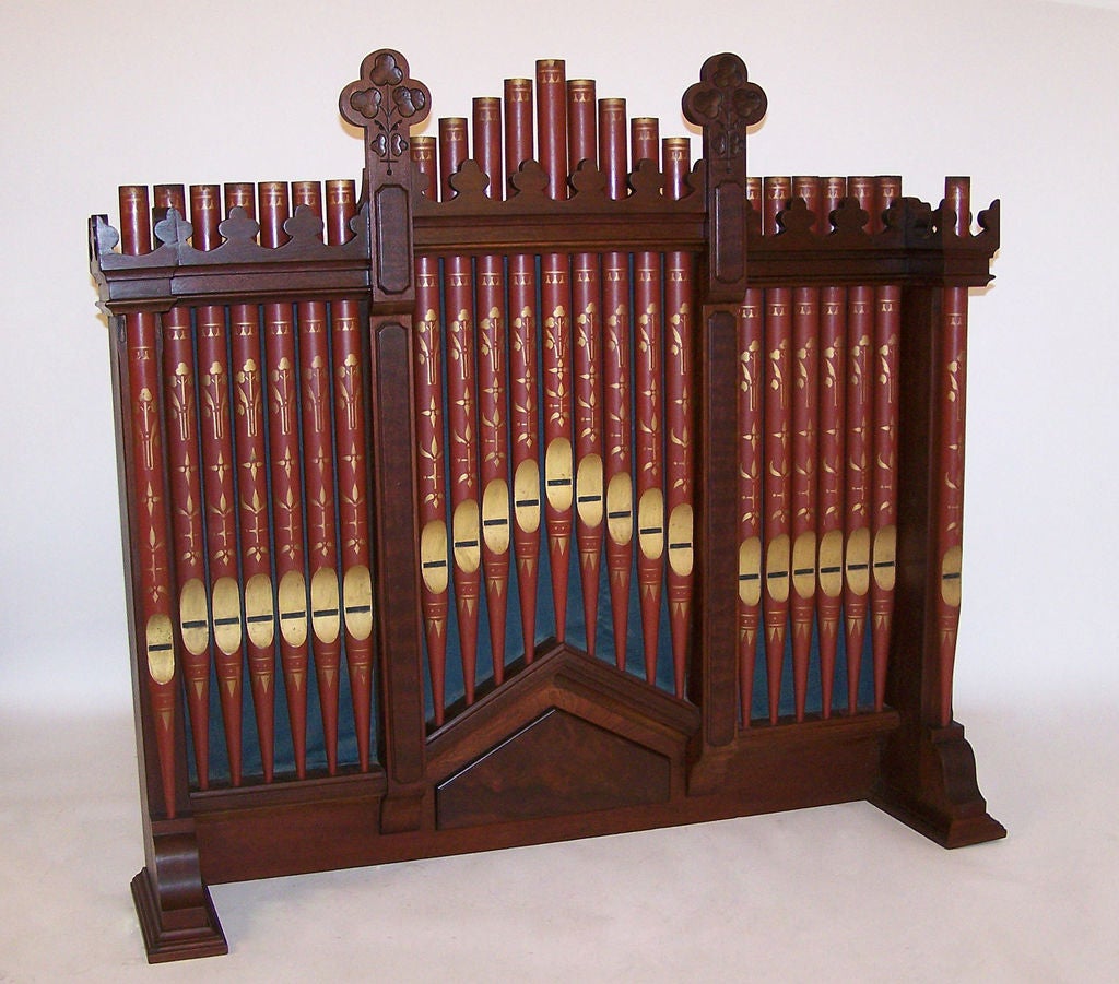 American Victorian faux organ pipes. These painted wood pipes would have sat on top of a pump or treadle organ after real pipes became unnessary. Would make a spectacular and interesting mantle piece.