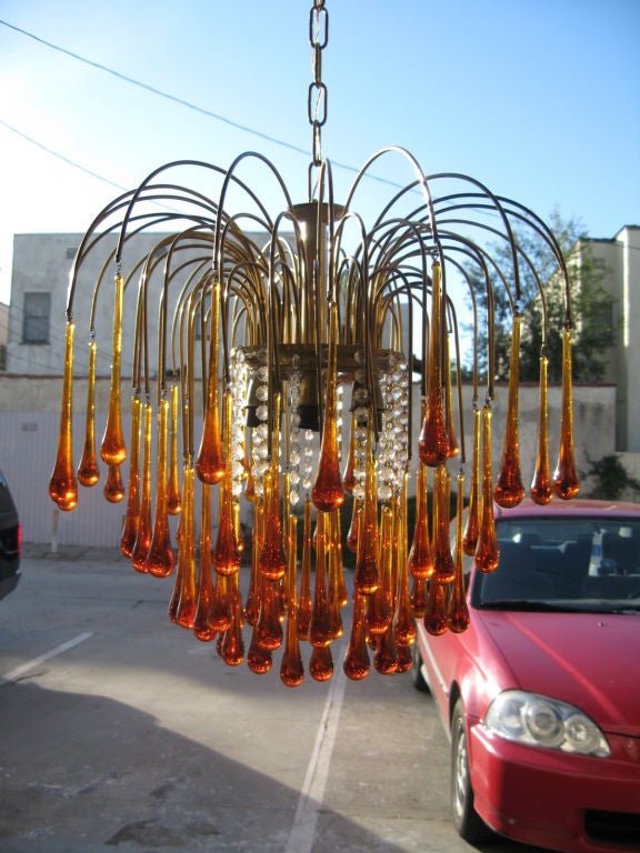 Brass and Murano teardrop amber glass chandelier.