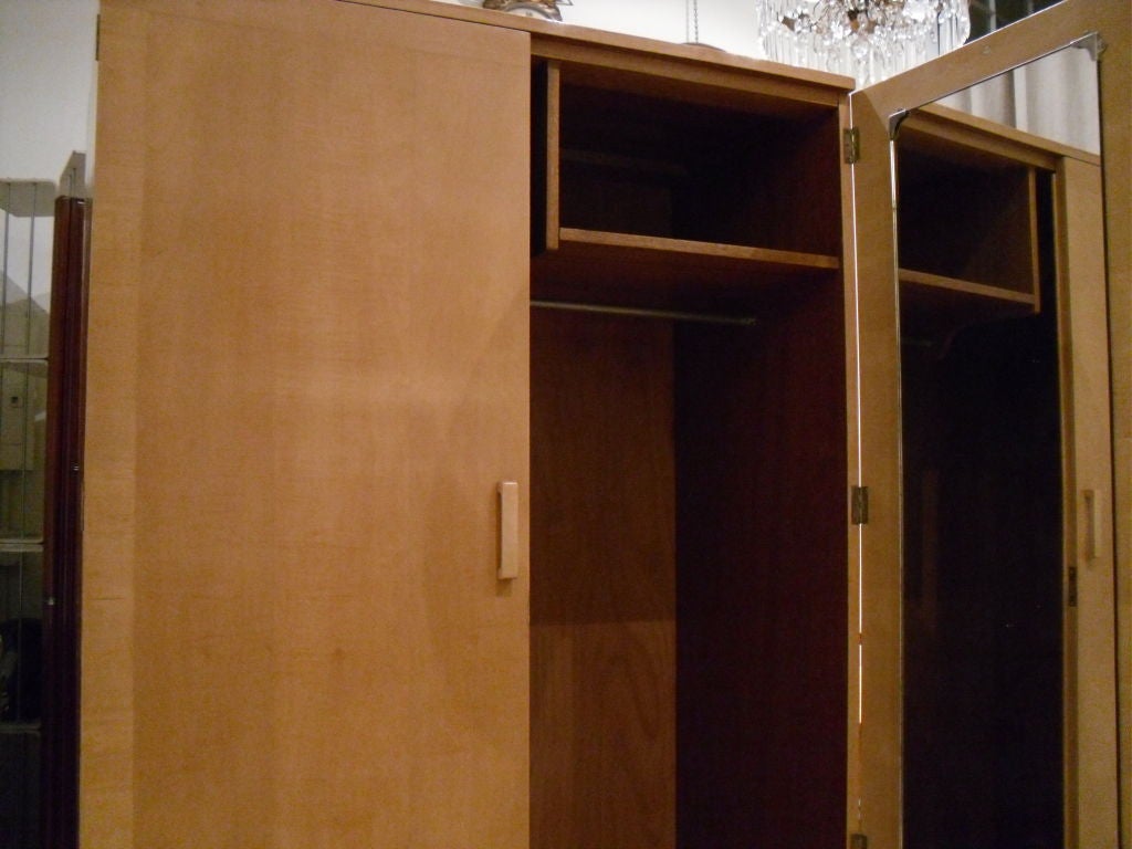 Gerald Summers ( 1899-1967) was the most innovative designer of modern furniture in Britain in the 1930s. His Streamline design can be illustrated by this Sycamore Wardrobe.