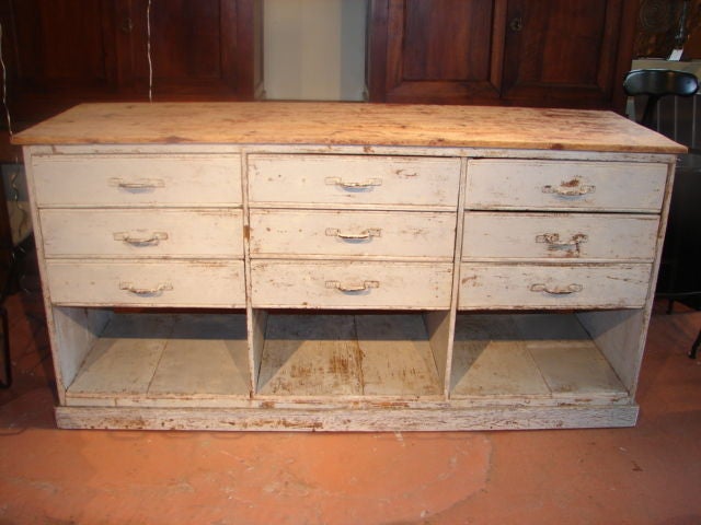 Painted cabinet with open lower shelves