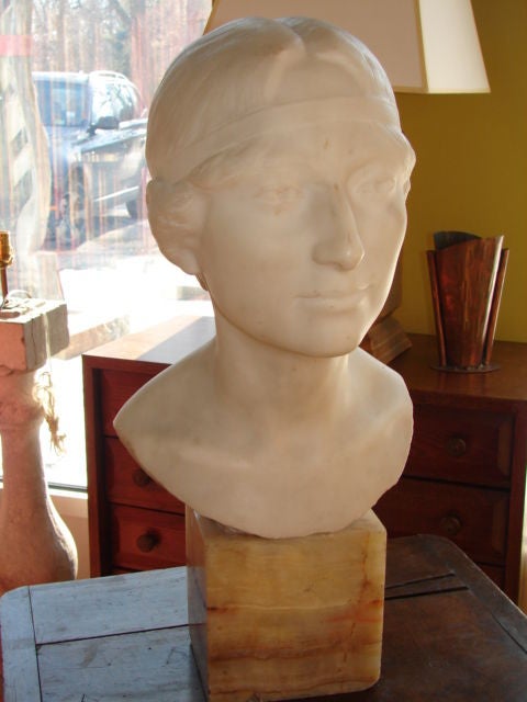 Signed and dated marble bust on onyx base, signed and dated, De Herain.