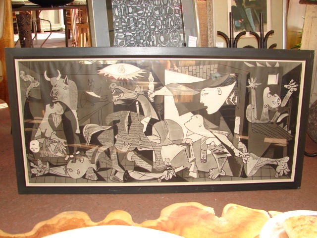 Large black and white print of Picasso's Guernica