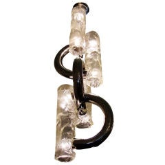 Elongated Venetian glass and chrome chandelier by Carlo Nason