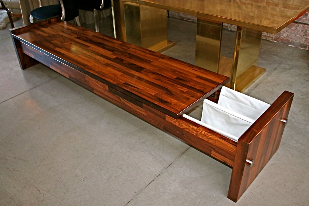 60's Zalszupin jacaranda bench with a leather magazine rack, nine feet long