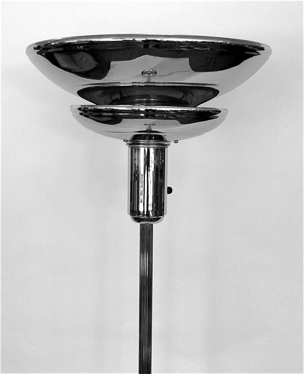 This great original floor lamp looks amazing lit. The light shines up from the first tier and illuminates the outside of the second tier while the light from the second shines upward. This lamp was designed to hold a mogul base bulb and can support