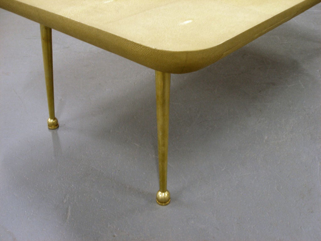 Cocktail table in dyed Shagreen and with brass legs and three drawers.

Visit the Paul Marra storefront to see more furnishings and lighting including 21st century
