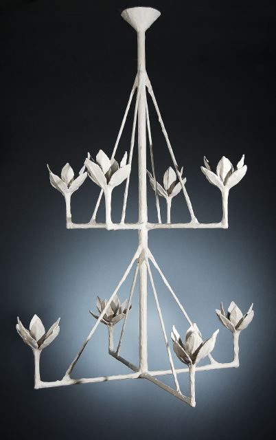 A Large Scale Hanging Chandelier, of Plaster and Iron. It's Rectilinear Qualities Mitigated by Bobeches in the Form of Opening Flower Buds. In the Style of Diego Giacometti. French, Contemporary