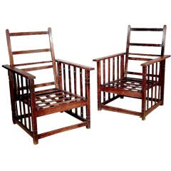 A Pair of Stained Morris Chairs
