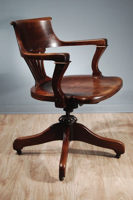 A French Stained Beechwood Fauteuil de Bureau with An Elegant Curving Back. Late 19th - Early 20th Century
