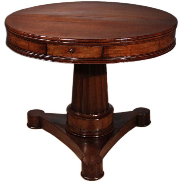 An Unusual Italian Neoclassical Walnut Drum Table, Lombardy