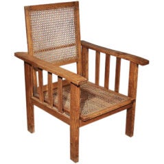 Used A French Morris Type Stained Oak and Caned Lounge Chair