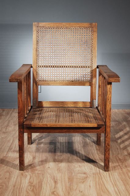 A French Morris Type Stained Oak and Caned Lounge Chair
