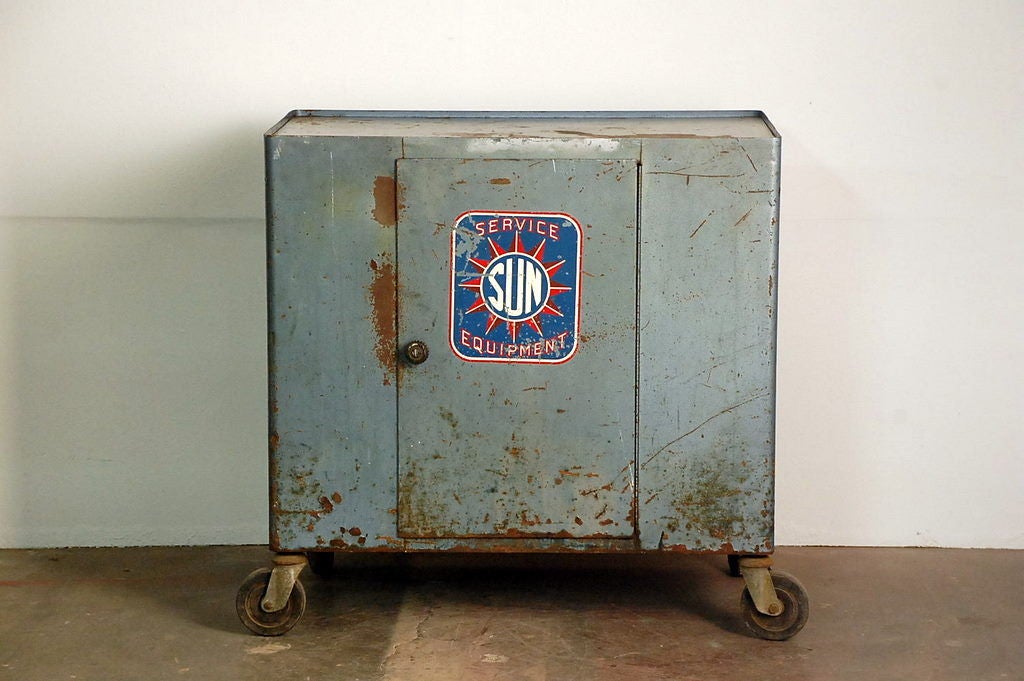 Heavy Industrial storage unit on wheels. Great as an oversized bar cart, with a large serving surface and plenty of storage below.