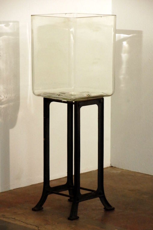 Cast Laboratory / industrial glass container on stand