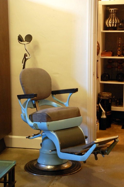 Heavy articulated dentist chair. Reupholstered in gray suede. Great for a loft...