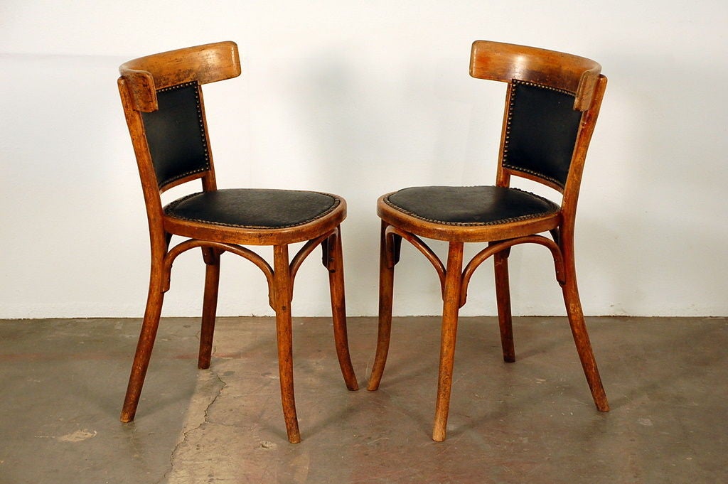 Set of 7 + 1 French bistro early 20th century dining chairs 2