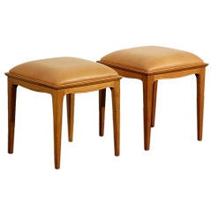 Pair of chic leather stools in the style of Jean-Michel Frank