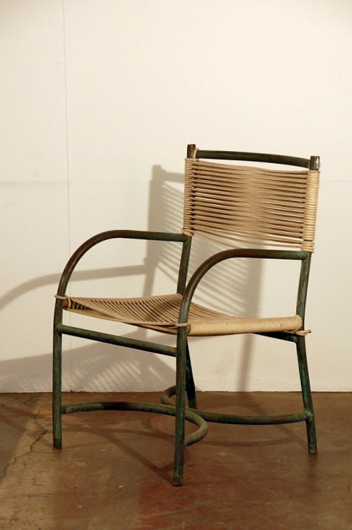 Rare single bronze and cord chair by Walter Lamb. Early design from Santa Barbara, circa 1945.