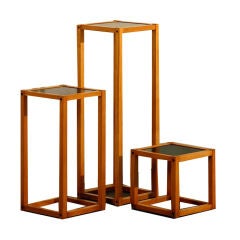 Series of 3 pedestal tables by Andre Sornay