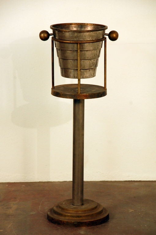 Silvered Champagne bucket on stand by Larry Laslo for Towle http://www.1stdibs.com/articles/style_compass/larry_laslo/index.php
