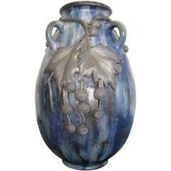GLAZED TERRACOTA VASE WITH PEWTER DETAILS BY ROGER GUERIN