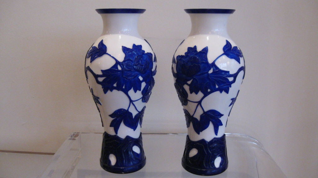 Pair of white and cobalt blue Peking Glass vases.