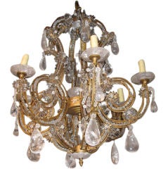 MAGNIFICENT ROCK CRYSTAL AND GILDED IRON CHANDELIER