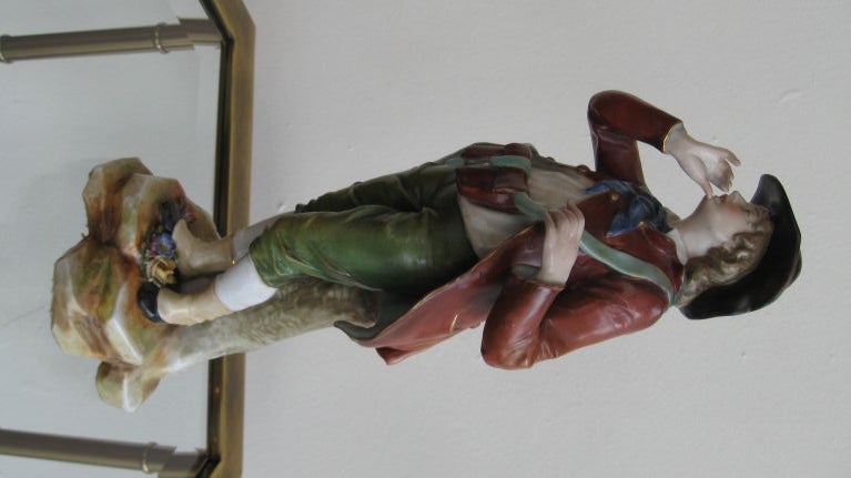 Single male figurine by Capodimonte, the well known Italian porcelain maker.