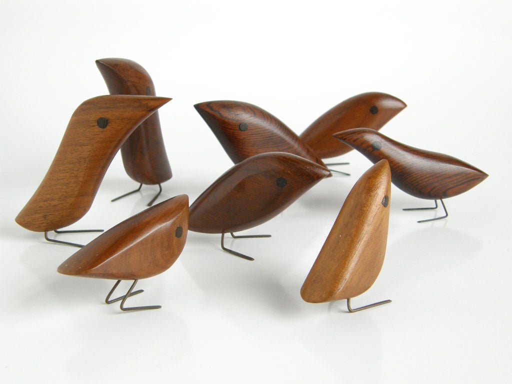 Very sweet set of 8 carved wooden birds, nice tactile forms. Mixed woods and shapes, hand worked and no 2 exactly alike.