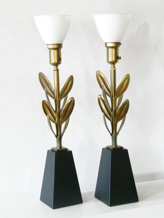 Stiffel plant lamps with stylized leaves and lacquered wood bases.