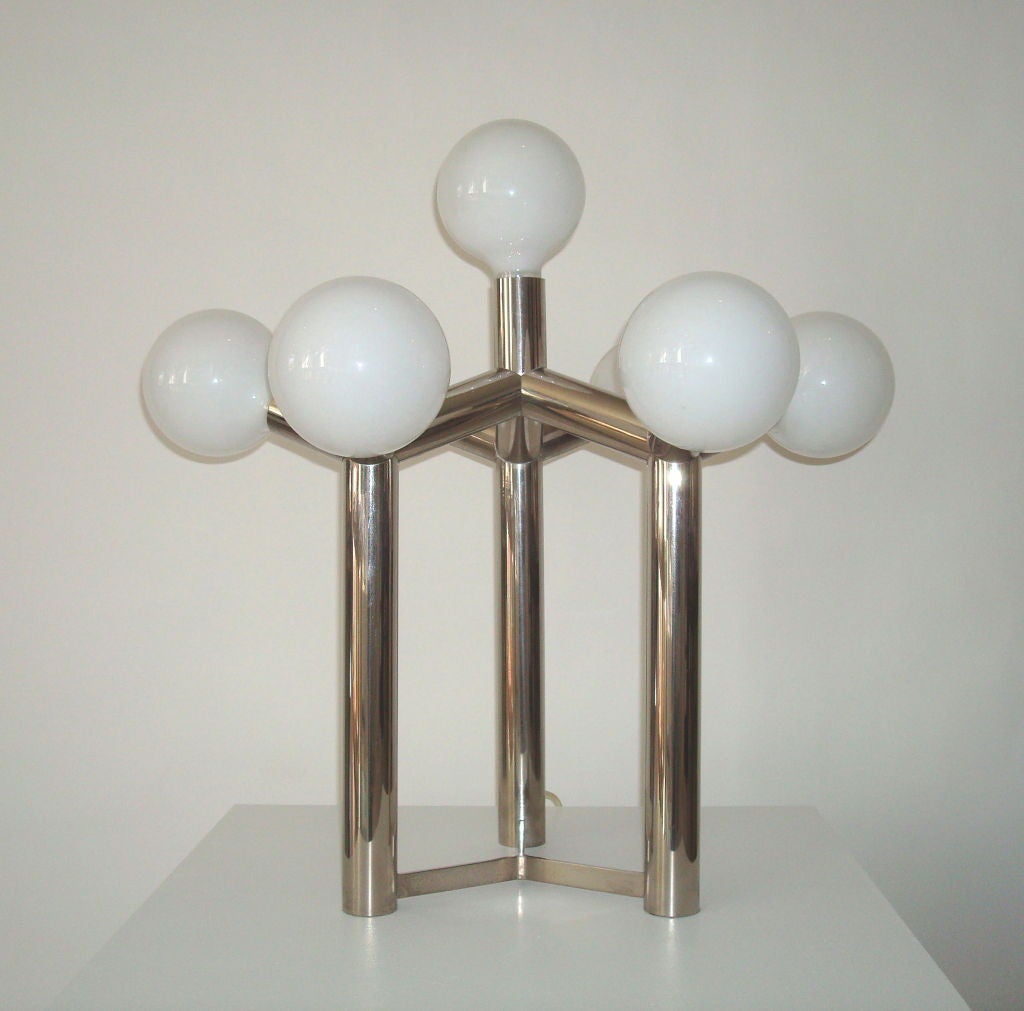 Minimalist, table lamp by Kalmar, using 7 oversized light bulbs.