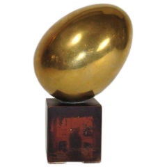 French Brass Ovoid Sculpture on Red Lacquered Pedestal