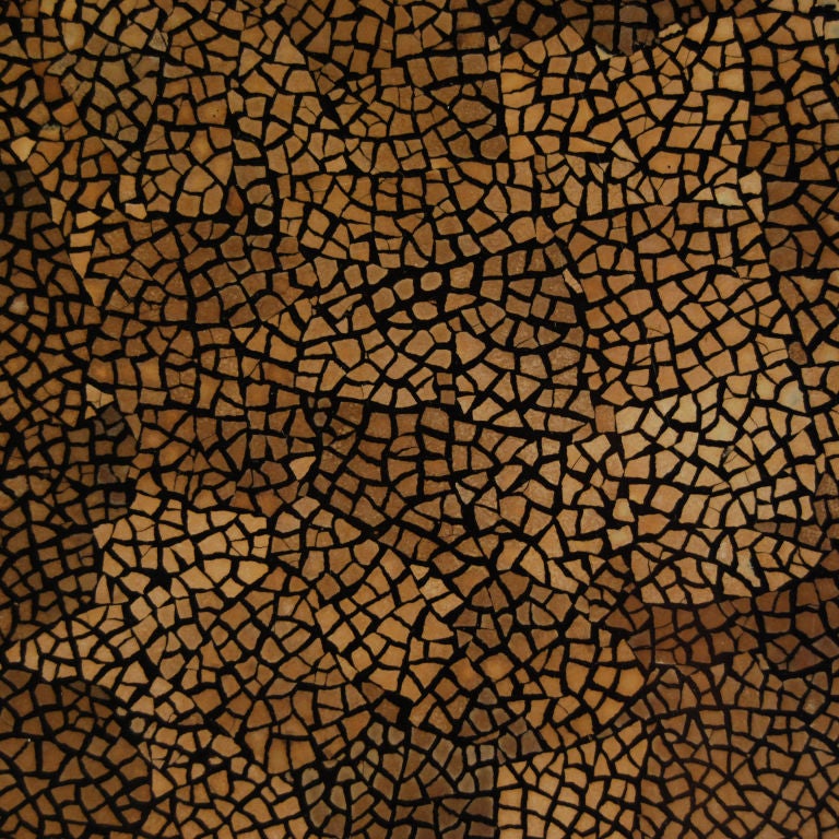 A 20th century Vietnamese low table covered in crushed egg shells and clear lacquer.

Pagoda Red Collection #:  GDG046


Keywords:  Table, coffee, cocktail, low, occasional