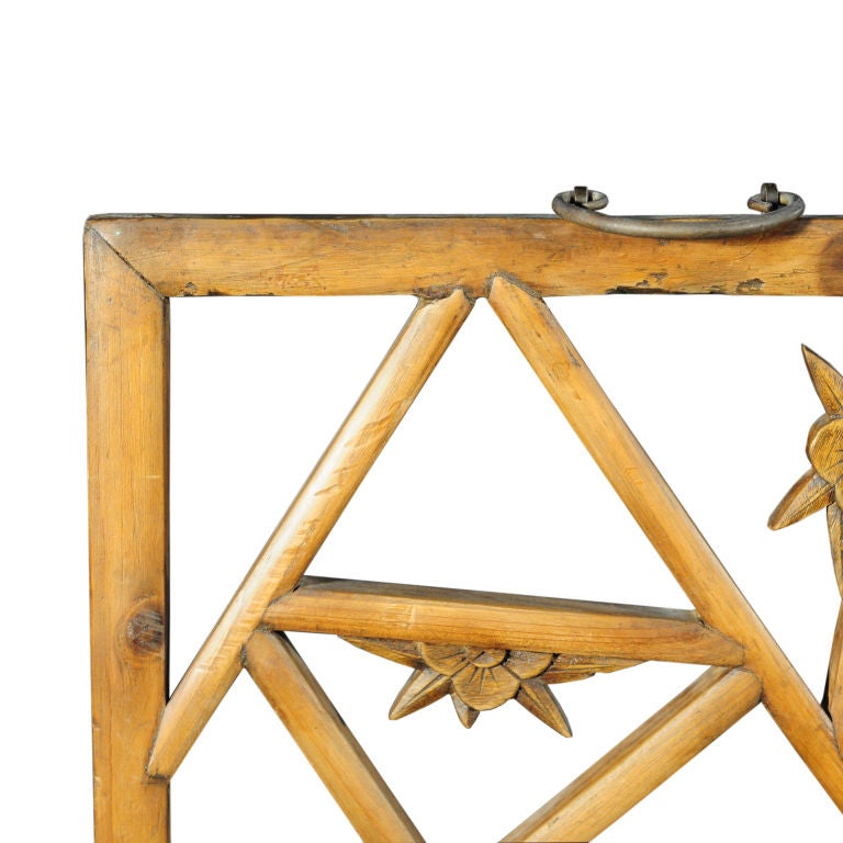 A 19th century Chinese elmwood courtyard lattice panel with cracked ice and floral pattern.<br />
<br />
Pagoda Red Collection #:  CAG022<br />
<br />
<br />
Keywords:  Panel, lattice, screen, mirror, painting, wall hanging