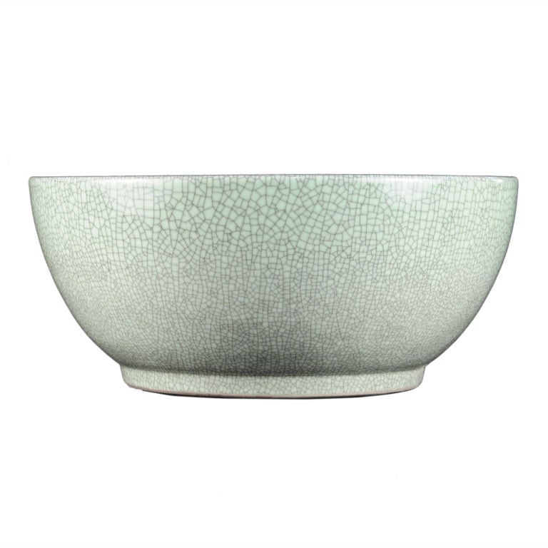 A monumental 20th century Chinese celadon crackled glazed porcelain bowl.<br />
<br />
Pagoda Red Collection #:  Y216<br />
<br />
<br />
Keywords:  Bowl, basin, vessel, vase, sink, planter, pot, urn