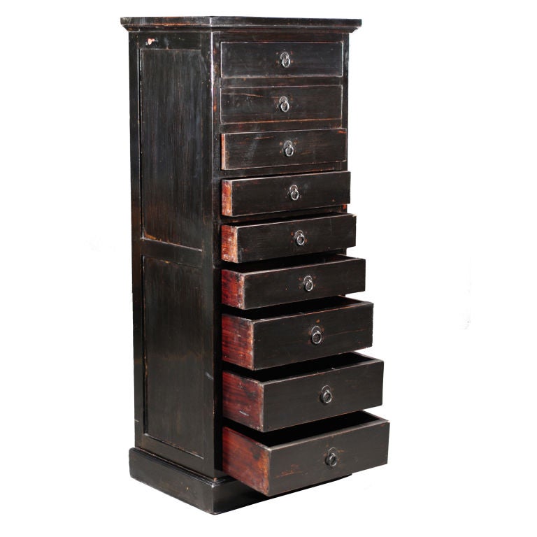 An early 20th century Chinese black lacquered elmwood document chest with 9 drawers and brass hardware.<br />
<br />
Pagoda Red Collection #:  CAG033<br />
<br />
<br />
Keywords:  Cabinet, chest of drawers, lingerie, file, jewelry, dresser,