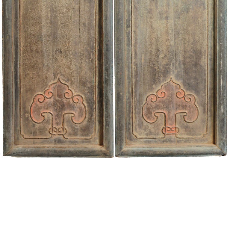 A gorgeous set of 8, early 18th century provincial Chinese courtyard panels with original celadon and burnt orange lacquer, with carved ruyi details at the bottom.