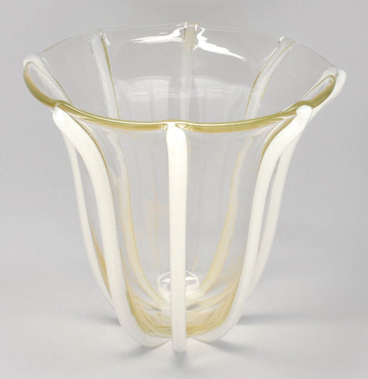 This is a large and rare  gold vase, highlighted with white glass canes internally decorated with gold