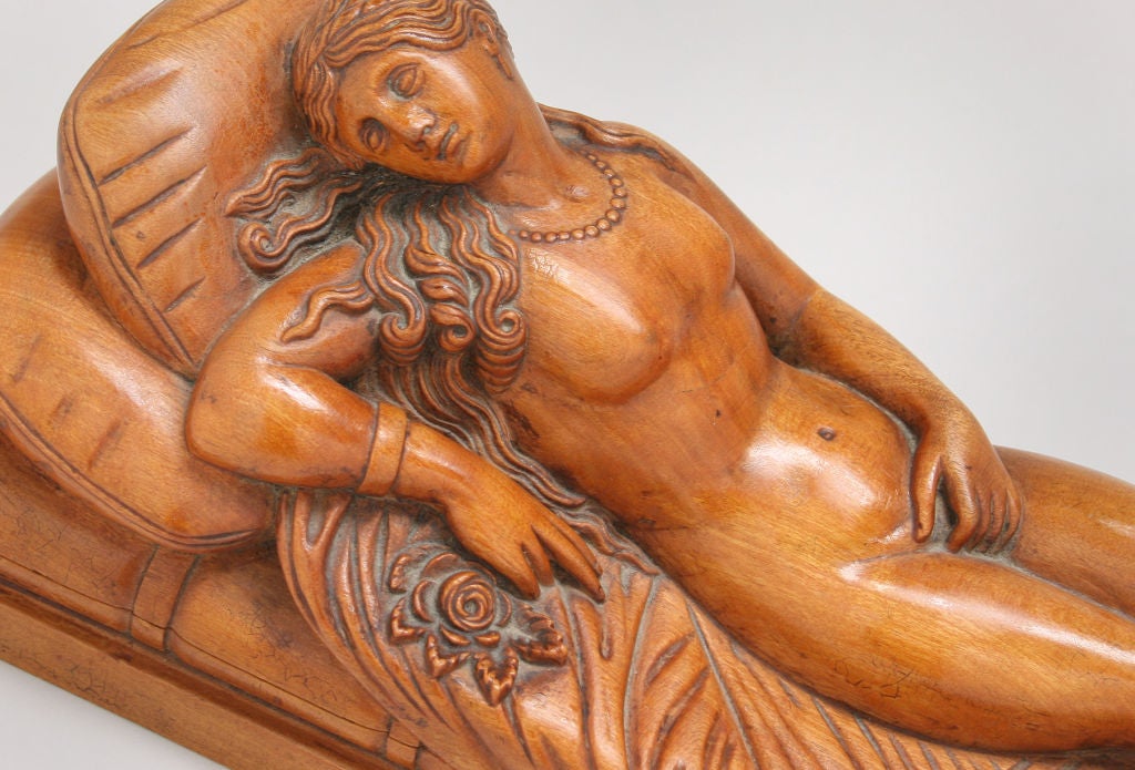 This is a fabulous piece. The patina is wonderful with very good detail in the carving.