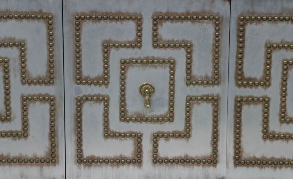 1970's studded cabinet with metal clad doors