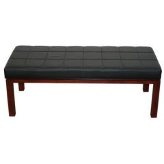 Black leather tufted bench